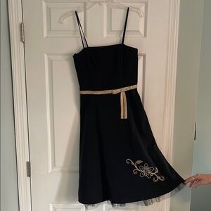 Elegant Black Dress with Gold Accents